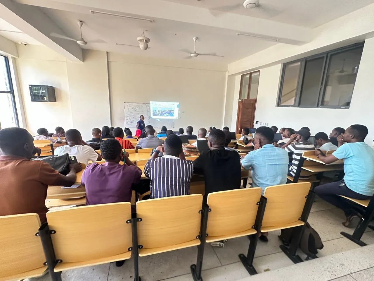 Msambili Ndaga teaching students during a technical training session